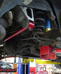 Red Non Adjustable Panhard Bar For 1998 To 2002 Camaro Firebird GM F Body Rear Tubular Suspension Upgrade For Improved Stance Handling And Wheel Alignment installed under rear suspension