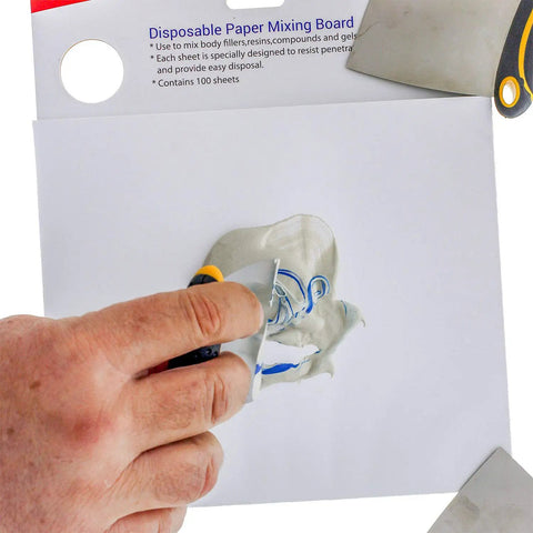 Hand using Pro Grade Multi Layered Disposable Paper Body Filler Mixing Board With 100 Sheets, Clean Resin Resistant Surface