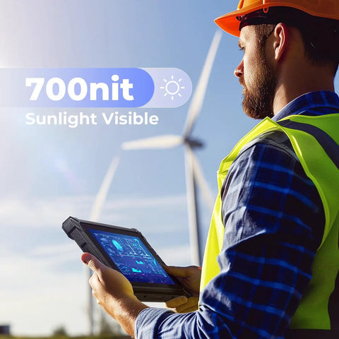 Man holding Badass Rugged Windows Tablet With 8-Inch Sunlight Readable Screen outdoors; 700 nit touchscreen visible at job site.