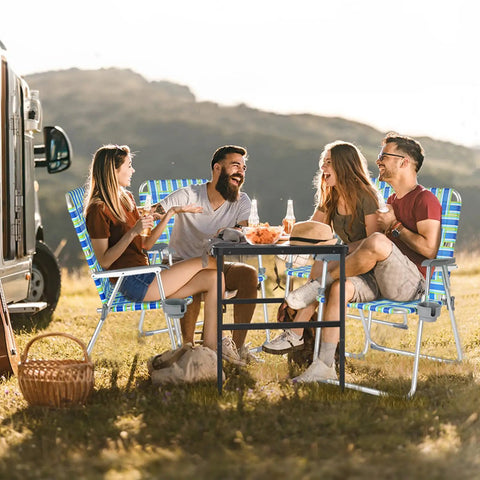 Group of friends enjoying outdoors in Oversized Folding Aluminum Beach Chair Set With Webbed Seat And Detachable Cup Holder