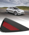 Bolt On Replacement Right Side Rear Bumper Reflector Cover With Bold Red Lens For Tesla Model 3 And Model Y 2017 To 2020 Models side view on road.