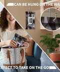 Heavy Duty 3.5 Mil Nitrile Disposable Gloves In Bold Black being stored in a handbag and hung on the wall, perfect for kitchen use.