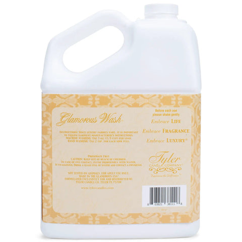 Glamorous Wash High Maintenance Laundry Detergent Gallon 128 Oz Floral Woody Scent bottle showcasing instructions and label