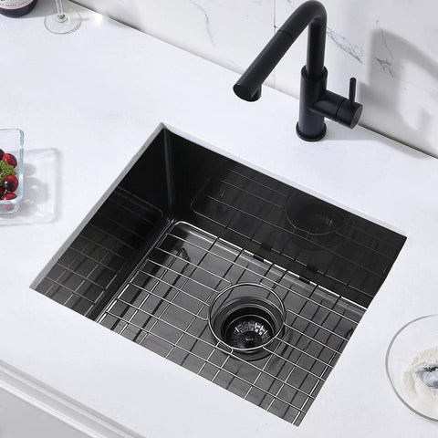 Top view of Built To Last 16 Gauge Black Stainless Steel Undermount Kitchen Bar Sink 20 By 17 By 9 Inches with grid and faucet