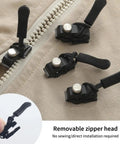 Close-up of 6-Piece Zipper Repair Kit with removable heads on a beige fabric, showcasing universal zipper fixers for repairs.