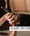 Pro Grade Upholstery Tack Strip Featuring No Sweat Install Heavy Duty Brass Nailhead Trim With Antique Rivets for sofa reupholstering in use.