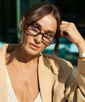 Woman wearing Retro Rectangle Blue Light Glasses For Women And Men, Leopard Print Tortoise Shell Frames With Blue Light Blocking Lenses