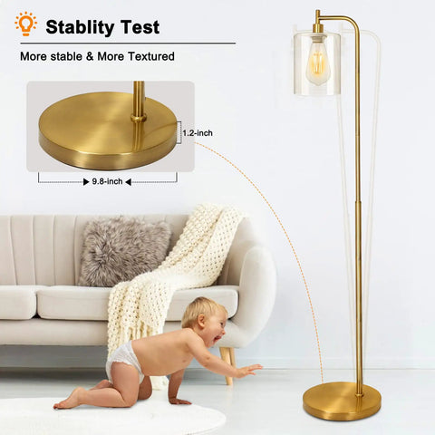Gold Industrial Floor Lamp With Glass Shade For Living Room And Bedroom Vintage Brass Standing Lamp With E26 Socket And Foot Switch Modern Rustic Lighting Dope Vibe next to a sofa and child highlighting stability
