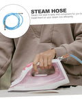 Person ironing with heavy duty PTFE steam hose attached to steam iron, illustrating reliable steam supply for easy ironing.