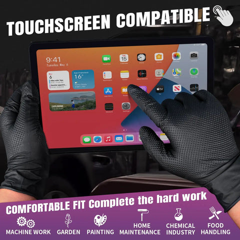 Heavy Duty Black Nitrile Disposable Gloves Bring Tough As Nails Defense With A Rock Solid Grip Pattern and 6.3 Mil Thick Shield to Dodge Razor Blades or Slippery Grease Sold In Pack Of One Hundred Medium Sized Tools For Badass Industrial Use, touchscreen compatible gloves used for handling tablet carefully.