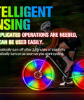 Cyclist using Three Pronged Bicycle Spoke Lights Set for Bike Wheels With 360 Degree Visibility LED Wheel Lights at night.
