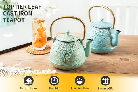 Cast Iron Teapot With Stainless Steel Infuser For Stovetop Brewing, 32 Oz Capacity, Enamel Interior, Light Green Leaf Design
