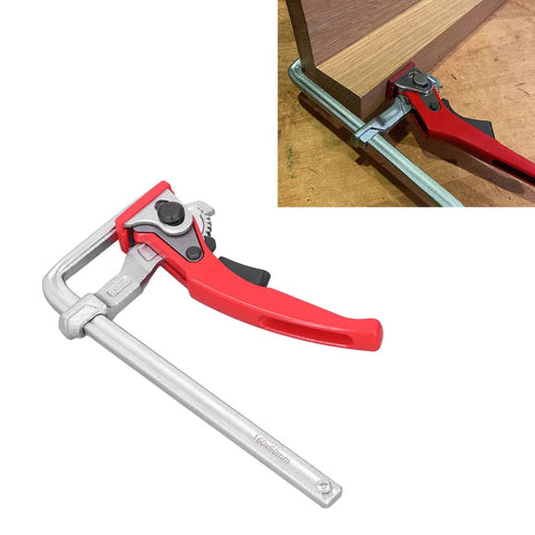 Heavy Duty Ratcheting Table Clamp Hardcore Rail Fixture For Woodworking and Rock Solid Material Stabilization Built With Premium Chrome Steel For Pro Shops in use, showing jaw clamp on wood.