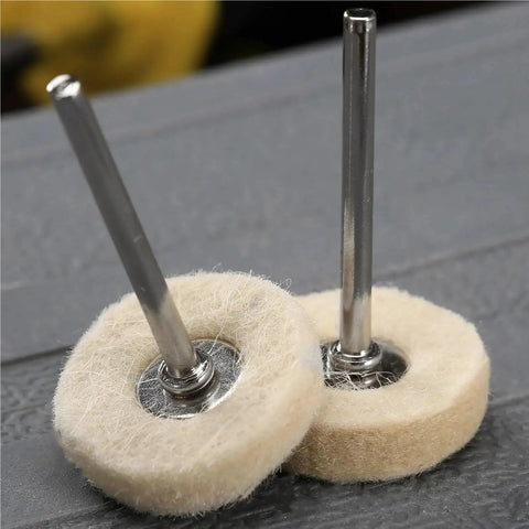 Pro Grade Wool Felt Polishing Wheel Kit 60 Pcs 25mm buffing wheels with 3mm shank close-up on gray surface