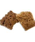 Unbleached Natural Sea Sponges 10 Pack Awesome Value For Arts And Crafts Set showing two sponges with varied textures for artistic use.