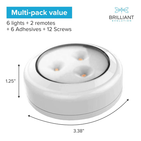Close-up of Wireless RGB LED Puck Lights Kit With Remotes For Under Cabinet Shelves And Walls, showing dimensions and contents.