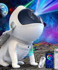 Dope Galaxy Night Light Projector With 6 In 1 Space Theme 21 Color Modes Bluetooth Speaker White Noise Dual Control Kid And Adult Friendly Gift For Cozy Nights showing astronaut design
