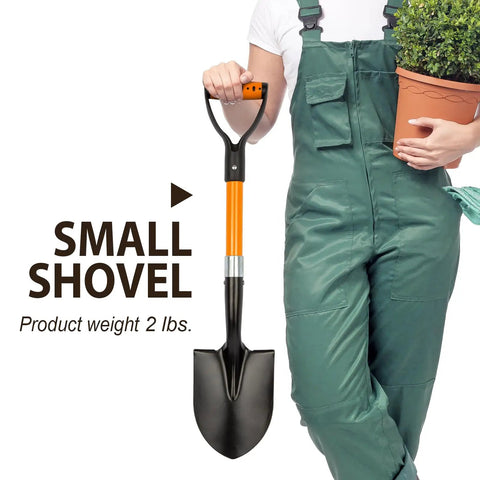 Person holding All Around Mini Garden Shovel 28 Inch D Handle Kid Friendly Beach And Garden Tool Lightweight Digging Spade next to plant