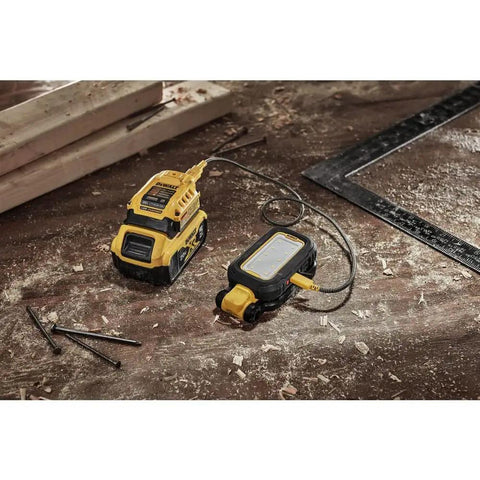 Beast Mode 1000 Lumen LED Work Light With Magnetic Handle USB C Rechargeable on a wooden workbench at a job site