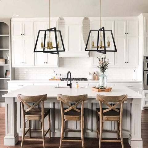 Black Brass Farmhouse Lantern Chandelier 4 Light Pendant With Bird Cage Frame Gold Finish over white kitchen island.