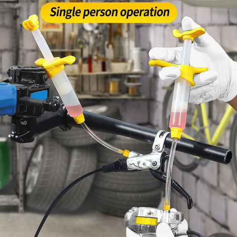 Single person using All In One Pro Grade Hydraulic Brake Bleed Kit With 180ml Mineral Oil for Shimano Tektro TRP Disc Brakes