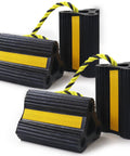Beefy Heavy Duty Wheel Chocks For Trailers RVs Campers Trucks And Small Aircraft - Solid Rubber Block With 3 Reflective Strips, Durable Wheel Immobilizers, Versatile Chocks - 4 Pack, 2 Pairs shown in black with yellow reflective strips.