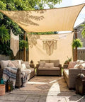 Pergola deck with 90 Percent UV Blocking Sun Shade Cloth 6x15 Ft in beige providing shade over outdoor seating area.