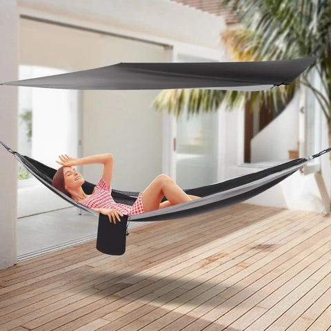 Heavy Duty Camping Hammock With Rain Fly Tarp And Mosquito Net 440 Lb Capacity Portable Tree Hammock for outdoor relaxation