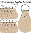 Fresh Veg Tan Leather Key Fobs In A Ten Pack With Pre Assembled Hardware ready for customization, featuring round and tear-drop shapes.
