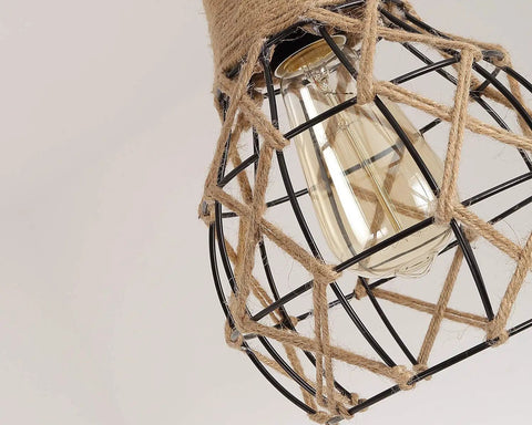 Close-up of Rustic Industrial Woven Pendant Light With Hemp Rope Cage showing bulb and black metal frame detail