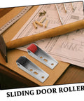 Smooth Ride Heavy Duty Sliding Door Roller Wheels For Wooden Barn Doors with red and black rollers on a workbench with tools.
