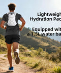 Runner wearing lightweight hydration backpack for running and hiking with 1.5L water reservoir on a trail