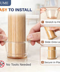 Person demonstrating installation of Silicone Chair Leg Protectors Fit 0.9 To 1.29 Inches on wooden chair leg.