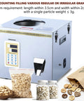 Digital Counting Filling Machine For Buttons And Small Toys, compact stainless steel unit for precise granule packaging.