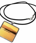 Molokai Sunset Outrigger Canoe Pendant Necklace With 1x1 Inch Rectangle Charm On A 17 Inch Black Rubber Cord Silver Tone Lobster Clasp Zinc Alloy Pendant Gold Organza Pouch Included Island Vibe Jewelry
