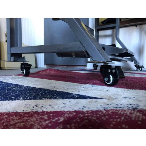 Heavy Duty Polyurethane Swivel Caster Wheels Set Of Four With Parking Brakes M10x25mm Threaded Stem on furniture rolling smoothly on carpet.