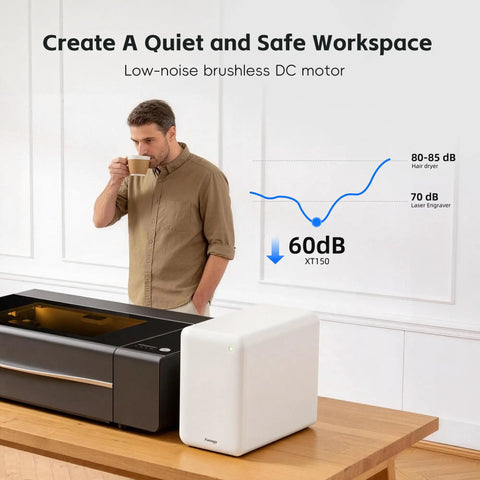 Ultra Powered Laser Fume Extractor Snatches Heavy Smoke And Nasty Odors Straight Away, shown next to a laser engraver, in a quiet workspace.