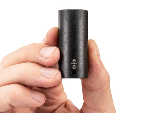 Hand holding One Quarter Inch Drive Five Eighth Inch Deep Six Point Impact Socket For Heavy Duty Auto And DIY Fixups, marked size