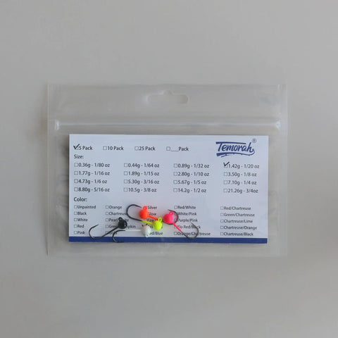 Rugged Lead Free Tungsten Jig Heads With Premium Mustad Hooks 1/32 To 1/8 Oz Pack Of 5 displayed in packaging with color options.