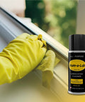 Gloved hand cleaning window track with Go To All Purpose Metal Lubricant And Cleaner Spray For Rust Prevention Polishing And Protection.