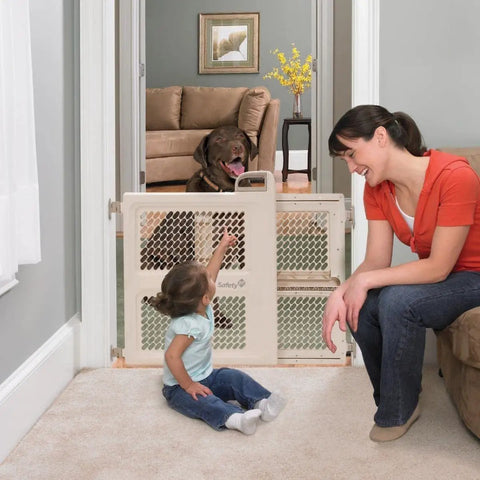 2-In-1 Baby Gate With Hardware Mount For Stairs And Doorways, Pressure Install Option, shown in doorway with child and dog.