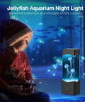 Child watching Jellyfish Lamp Mood Night Light For Desk And Room Decor, USB Powered Colorful Aquarium Light With 3 Floating Jellyfish.