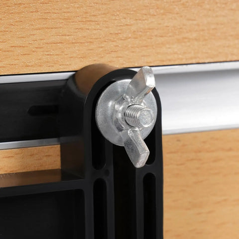 Close-up of adjustable clamp on Solid Build Router Table with Heavy Duty Stand and Adjustable Fence Premium MDF Workbench.