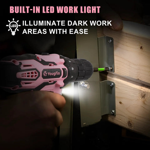 Pink Cordless Drill Driver Kit 12V with LED light illuminating wood while screwing, ideal for DIY home projects.