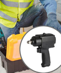 Compact Mini Pneumatic Impact Wrench Featuring Aluminum Alloy Chassis And Ergonomic Non Slip Handle in use, highlighting grip and air connection.