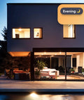 Smart Downlight Retrofit Kit With SuperColor Technology, 800 Lumen, 90 CRI illuminating modern house exterior at dusk