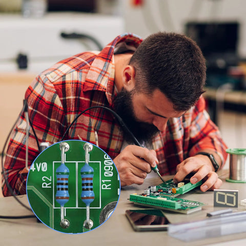 Resistor assortment kit on workbench; man soldering a green PCB, inset close-up of blue metal-film resistors.