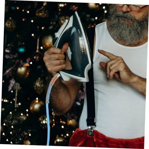 Man with beard holding an iron connected to High Pressure Steam Hose For Steam Iron 3 Meter Pro Grade Replacement Tube