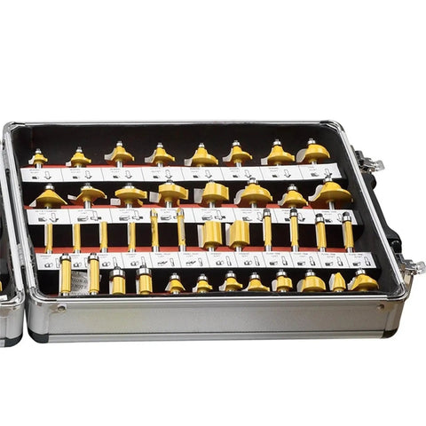 Deadly Sharp 100 Piece 1/4 Inch Shank Router Bit Set Tungsten Carbide Woodworking Milling Cutters displayed in heavy duty aluminum case.