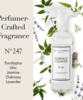 Go-To All Purpose Surface Cleaner No 247 Scent with perfumer crafted fragrance in 15.5 fl oz bottle next to eucalyptus and lavender leaves